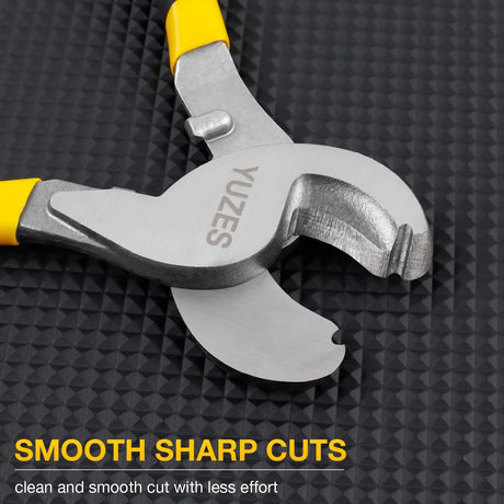 Close-up of the open curved blades on a yellow-handled cable cutter