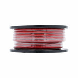 Side view of a red T-Spec power-wire spool wrapped in clear protective film