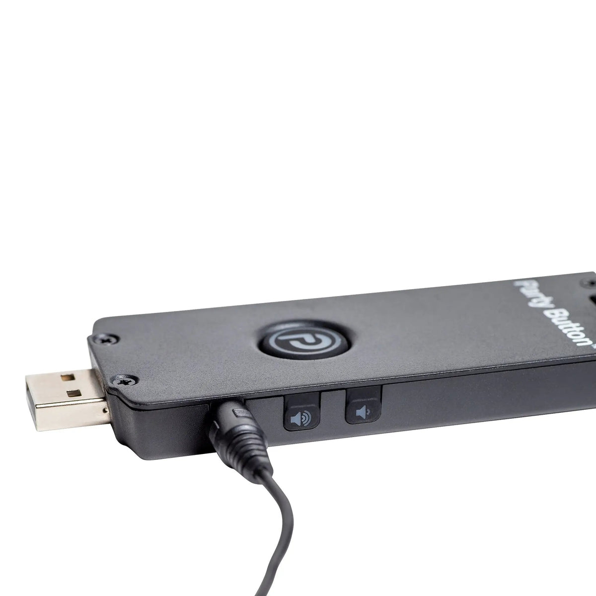 Close-up of a Bazooka iNVITATION adapter with its audio cable plugged in beside the USB connector