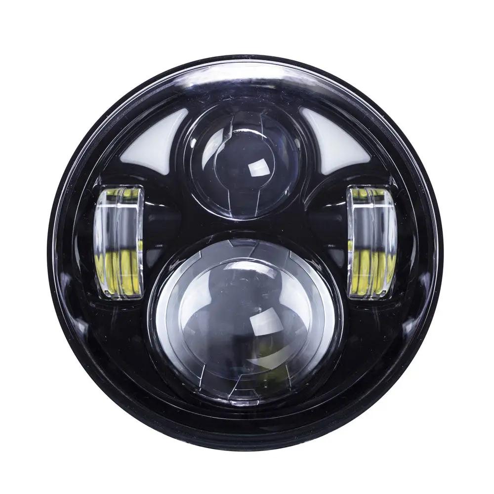 Round black LED headlight with two central projector lenses and side light strips