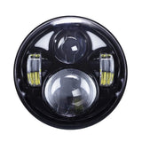Round black LED headlight with two central projector lenses and side light strips
