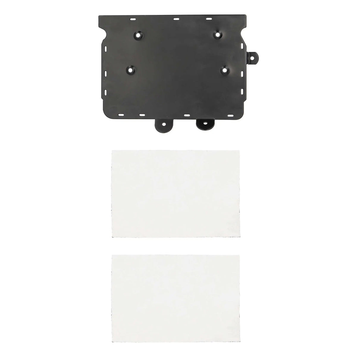 Black amplifier mounting plate beside two rectangular white pads