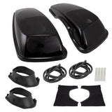 Pair of glossy black speaker saddlebag lids with mesh grilles, mounting rings, seals and hardware