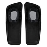 Undersides of two black saddlebag lids showing speaker openings and mounting points