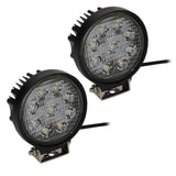Pair of round driving lights with nine LEDs each, black finned housings and mounting brackets