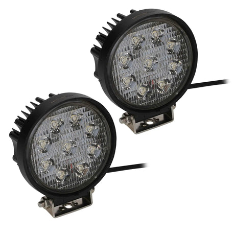 Pair of round driving lights with nine LEDs each, black finned housings and mounting brackets