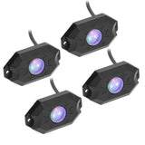 Four black rock-light pods with purple-lit lenses and attached leads