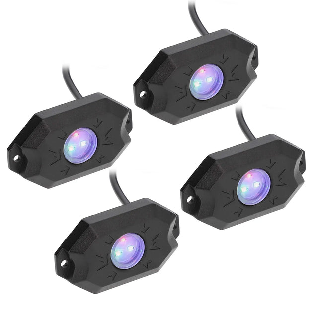 Four black rock-light pods with purple-lit lenses and attached leads