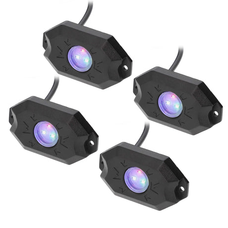 Four black rock-light pods glowing blue and purple