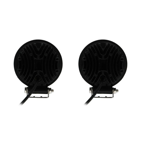 Rear view of two round LED lamps with finned housings, brackets and power leads