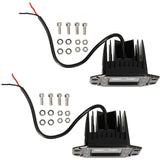 Rear view of two flush-mount LED lamps with finned housings, cables, bolts, washers and nuts
