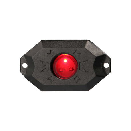 Black rock-light pod illuminated red, viewed from the front