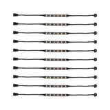 Ten LED accent light strips laid out with their attached connector leads