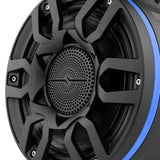 Close-up of a black speaker's grille, perforated central tweeter and blue illuminated outer ring
