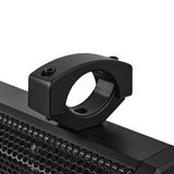 Close-up of a black split-ring mounting clamp attached to a mesh-grille soundbar