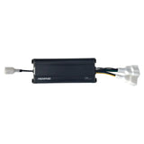 Compact black Memphis amplifier with attached wiring harnesses and white connectors