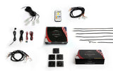 Gloshop lighting kit laid out with light strips, small LED modules, wiring, controller boxes and a remote