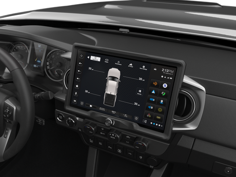 Wide touchscreen installed above dashboard climate controls, displaying vehicle tire-pressure information