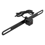 Black backup camera on a long slotted license-plate bracket with a coiled cable
