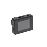 Rear view of a compact dash camera showing its screen and side buttons