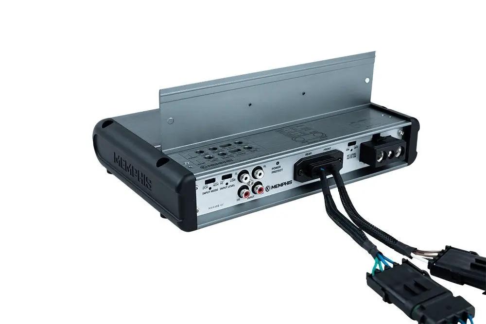 Memphis marine amplifier with its cover raised to expose RCA inputs, controls and wiring connections