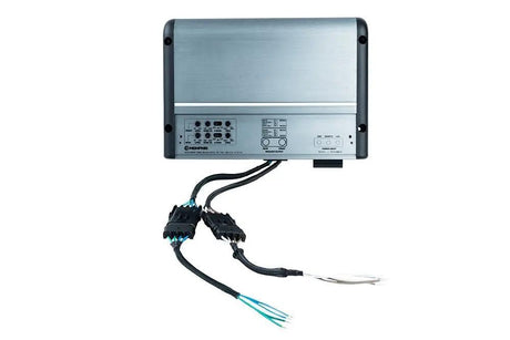 Memphis marine amplifier with its control cover removed and attached wiring harnesses visible