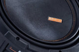 Memphis MOJO subwoofer cone close-up showing its textured surface, stitched surround and orange logo