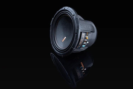 Angled Memphis MOJO subwoofer on a reflective black background