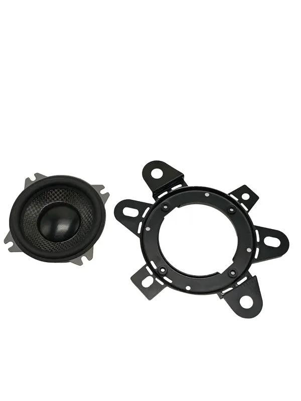 Small round Memphis speaker beside a black mounting adapter ring with multiple tabs