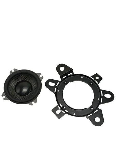 Small round Memphis speaker beside a black mounting adapter ring with multiple tabs