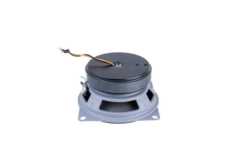 Rear of a small coaxial speaker with a gray basket, black magnet and short orange-and-black lead