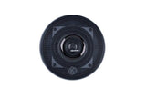 Round black mesh speaker grille with a central Memphis logo