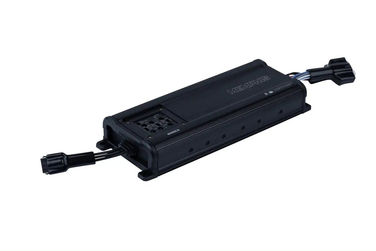 Black Memphis amplifier with a recessed control panel and plug-in wiring at both ends