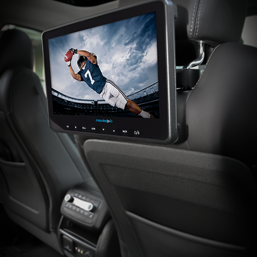 Movies To Go screen mounted behind a vehicle headrest and displaying a football player catching a ball