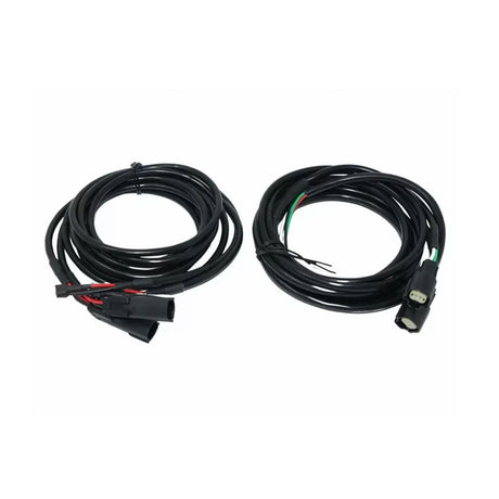 Two coiled speaker wiring harnesses with plug connectors and exposed wire ends