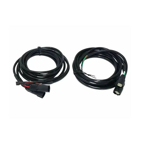 Two coiled speaker wiring harnesses with plug connectors and exposed wire ends