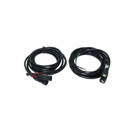 Two coiled speaker wiring harnesses with plug connectors and exposed wire ends
