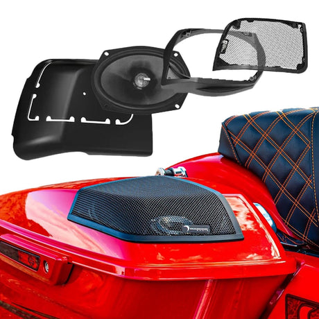 Diamond Audio oval coaxial speaker, mounting parts and mesh grille shown above an installed grille on a red motorcycle saddlebag