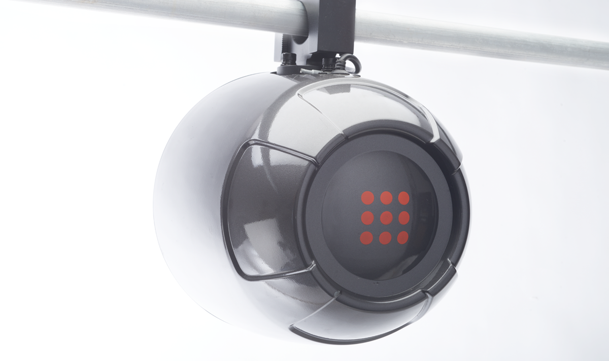 Rear view of PowerBass PBXS-POD6CLR speaker pod mounted to a tower bar, showing red rear illumination