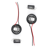 Rear view of two Pride Easy 25 tweeters beside their crossover capacitors