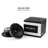 Pride Solo 140 6.5 speaker pair beside the labeled black retail box