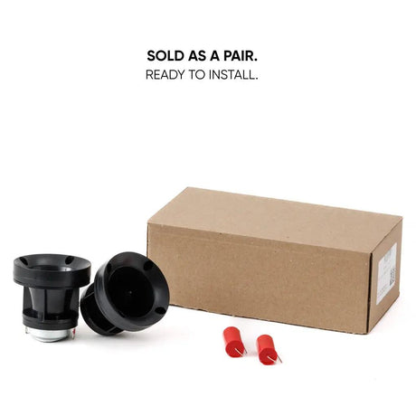 Horn tweeter pair, two red capacitors and a cardboard box with a sold-as-a-pair message
