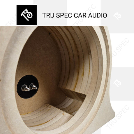 Close-up inside a layered TRU SPEC speaker enclosure showing the terminal bolts and internal support