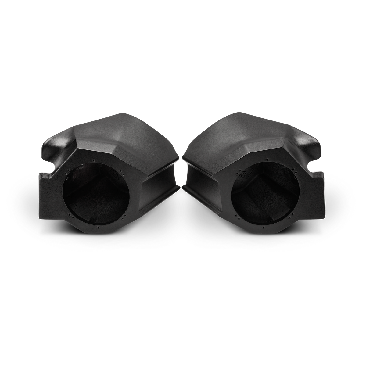 Two empty black molded speaker pods with round speaker openings