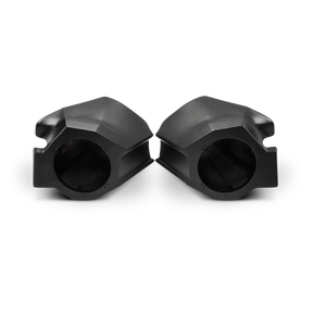 Two empty black molded speaker pods with round speaker openings
