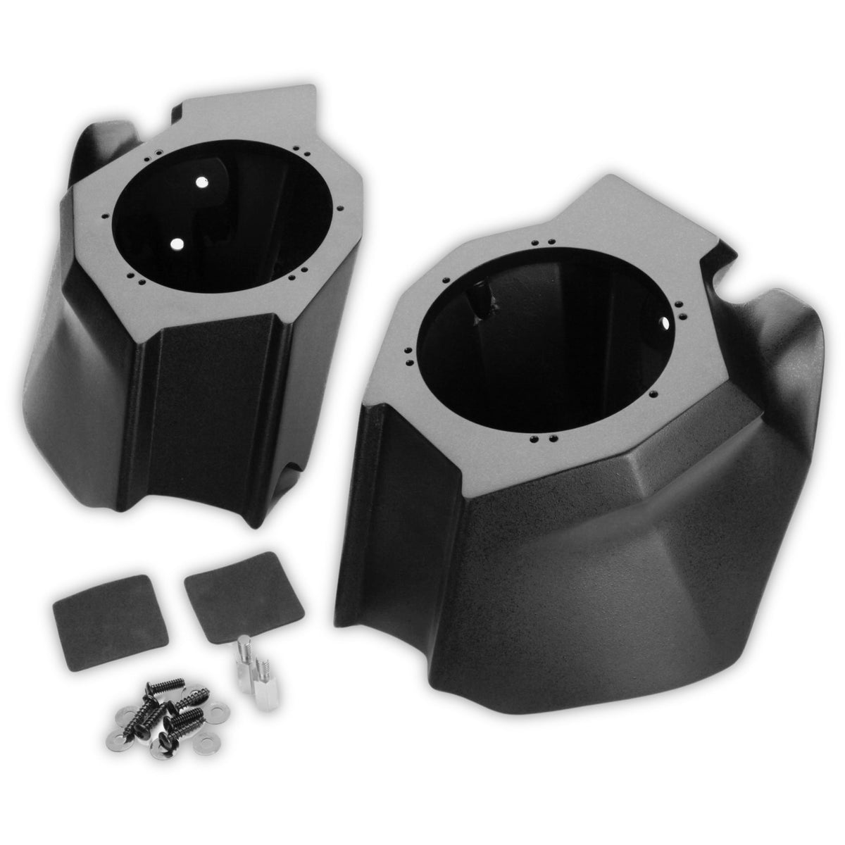 Two empty black speaker pods with mounting pads and screws