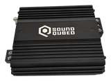 Angled view of a black SoundQubed amplifier with a finned housing and logo on top