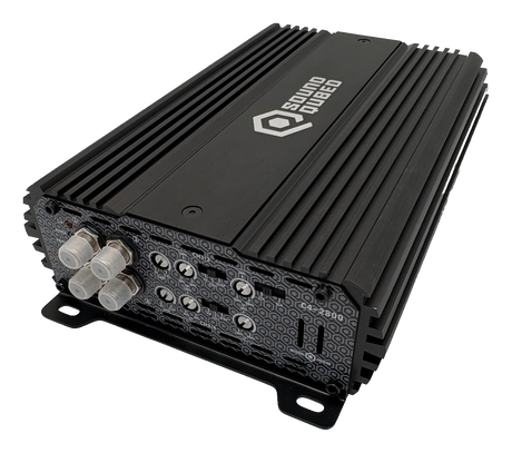 Angled view of a SoundQubed amplifier with four capped RCA inputs, adjustment controls and a patterned end panel
