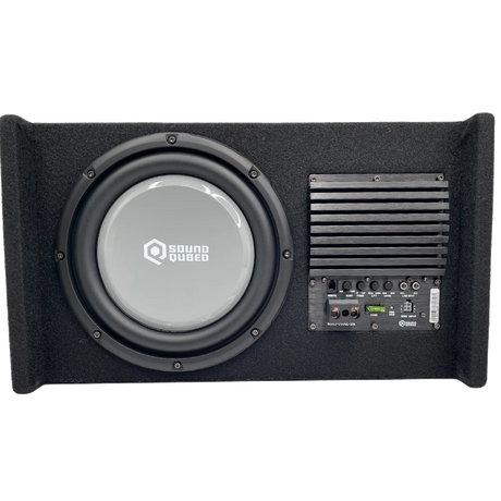 Black carpeted SoundQubed enclosure showing a gray-cone subwoofer beside a finned amplifier and controls