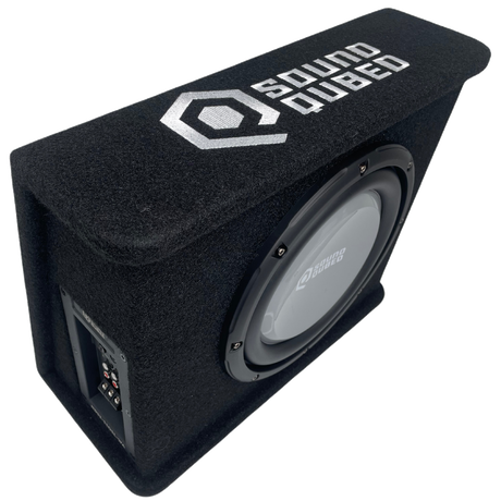 High angled view of a SoundQubed wedge enclosure showing its top logo, subwoofer and recessed side connection panel